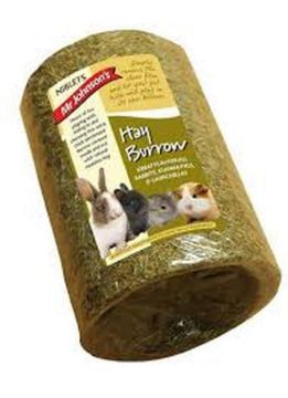 A roll of Hay Burrow pet bedding made from shredded grass, wrapped in clear plastic with a yellow and red label showing rabbits and guinea pigs.