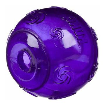 A translucent purple rubber dog toy ball with embossed swirl patterns and raised side grips, shown on a plain white background.