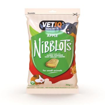 Vet1q Healthy+ Apple Nibblots for small animals in a resealable pouch. The packaging features a green central shield with white text, a red lower section, and illustrations of a cow, rabbit, and puppy.