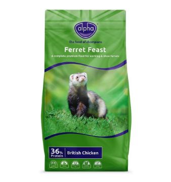 A bag of Alpha Ferret Feast pet food, specifically the British Chicken flavor. The packaging is predominantly green with a photo of a ferret sitting on grass in the center, and a blue 'alpha' brand logo at the top.