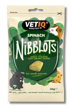 VetIQ Healthy Spinach Nibblots pet treat pouch for small animals, featuring a green and beige design with illustrations of a rabbit, a pig, and a mouse.