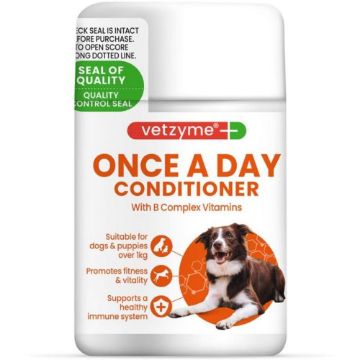 Vetzyme Once A Day Conditioner dog supplement bottle, featuring a white bottle with orange and green text, and an image of a brown and white dog on the front label.