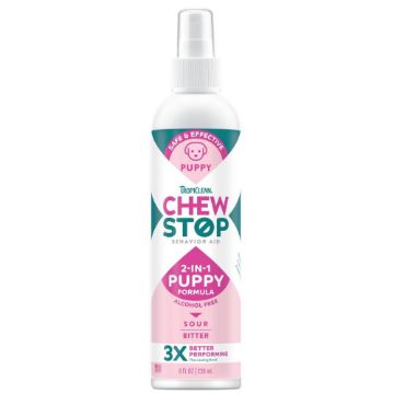 A bottle of Puppy Chew Stop spray by Tropiclean on a plain white background.