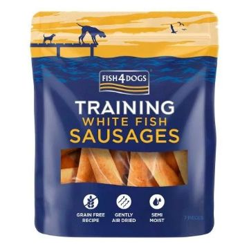 A package of Fish4Dogs Training White Fish Sausages, featuring a dark blue and yellow stand-up pouch with a clear window showing the sausages inside.