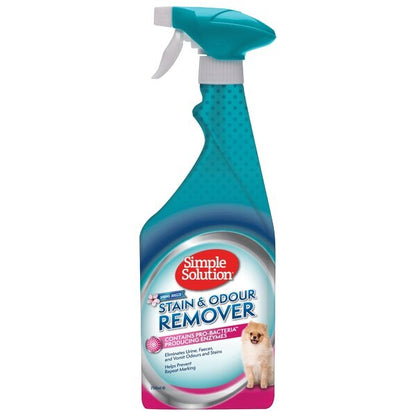 A bottle of Simple Solution Stain & Odour Remover with a spring breeze scent, designed for pet odor and stain removal.