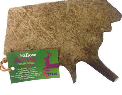 Deer antler with a green label on a white background