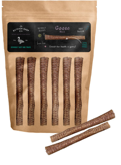 Packaging of The Butcher Shop Co. Goose Necks 50g, displaying the product name and description with visible gooseneck treats outside the package.