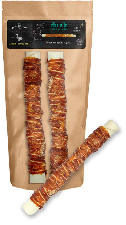 Pack of two white twisted sticks wrapped with duck, presented in a brown paper packaging.
