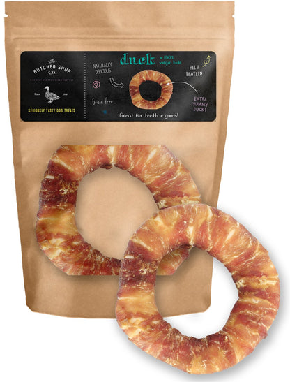 A white ring wrapped with DUCK fabric, presented in a packaging that indicates it is a product from The Butcher Shop Co.