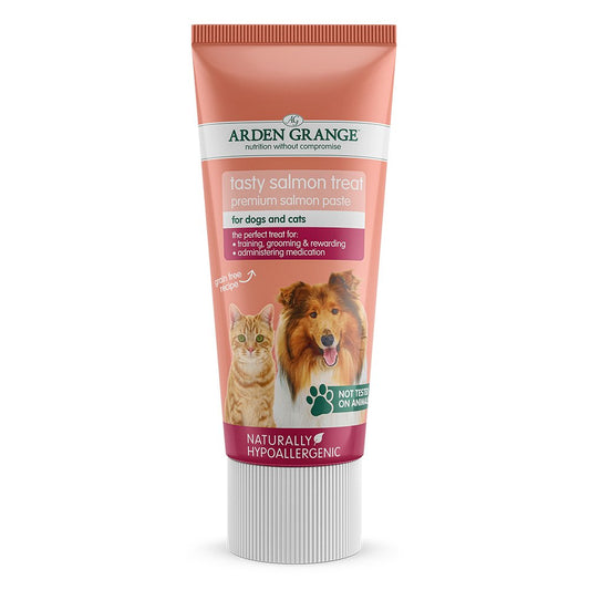 A tube of Arden Grange tasty salmon treat paste with images of a dog and a cat on the label, indicating that it is suitable for both dogs and cats.