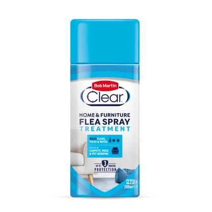 A bottle of Bob Martin Clear Home & Furniture Flea Spray Treatment, featuring a bright blue cap and a white and blue label with product details.