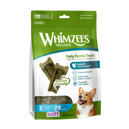 A package of Whimzees Soft Small dental dog treats. The packaging is green and white with an image of a dog and the product visible through a transparent window.