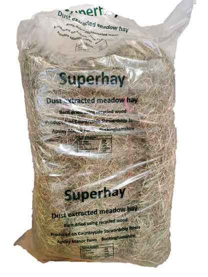 A bale of dust extracted Superhay in a plastic wrapping with branding visible.