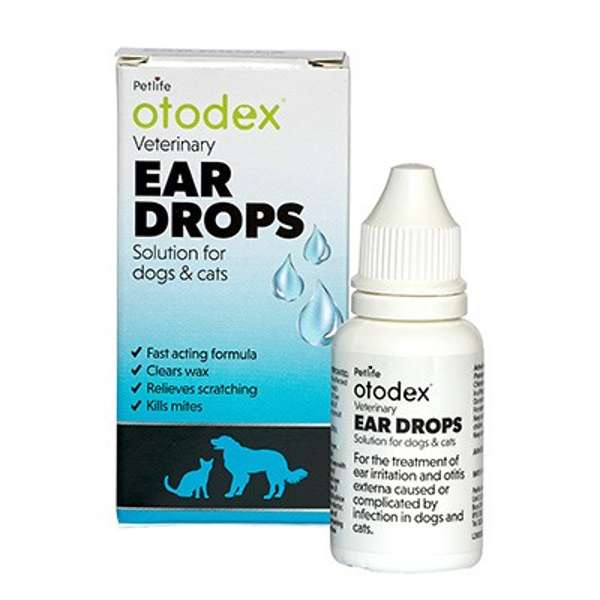 A box and bottle of Otodex Ear Drops for dogs and cats, with product information and branding.