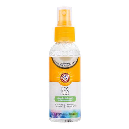 A bottle of Arm & Hammer Fresh Coconut Mint Dental Spray for pets, with a yellow cap and label detailing the product information.