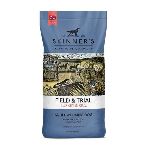 A bag of Skinner's Field & Trial dog food with a turkey and rice flavor. The packaging is blue with an illustration of a dog and outdoor scene.