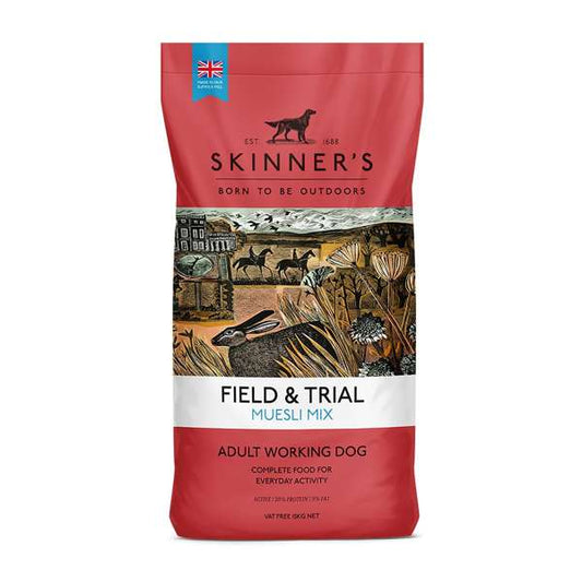 A red bag of Skinner's Field & Trial Muesli Mix for adult working dogs. The packaging features an illustration of a dog and a rabbit in a field setting.