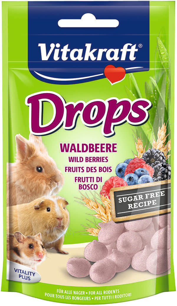 A package of Vitakraft Wild Berry Drops with images of small animals like a rabbit and a hamster, and fruits such as blueberries and raspberries. The package is green with a white and red text, and indicates a sugar-free recipe.